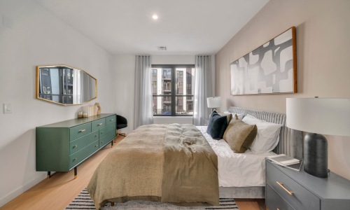 Everything you need right at your fingertips Bedroom with natural lighting and high ceilings