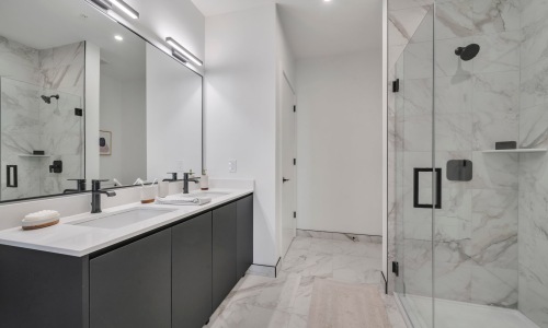 Bathroom options with thoughtful details Spacious bathrooms with glass showers