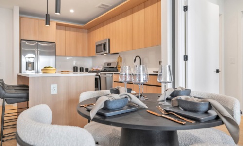 Elegance everywhere you look Well-lit kitchen with ample counter space and a dining area
